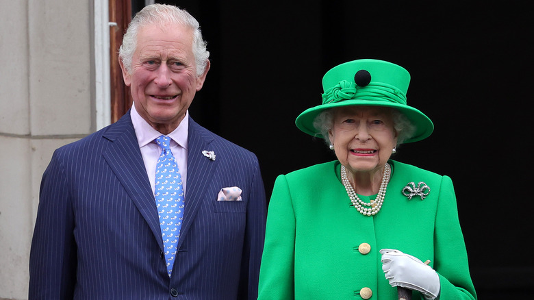 Prince Charles & Queen Elizabeth smiling 