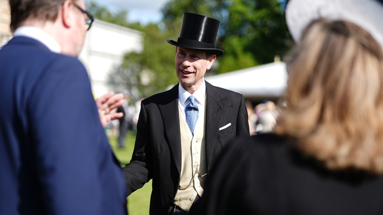 Prince Edward talking in top hat