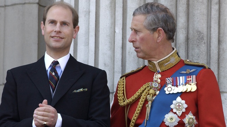 Prince Edward and King Charles on balcony