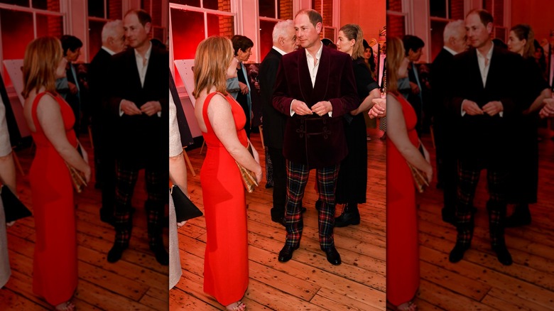 Prince Edward talking to woman at event