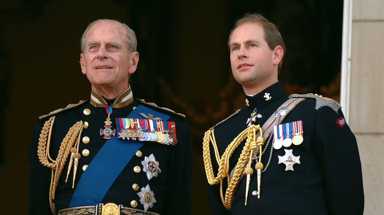 Prince Philip and Prince Edward looking up