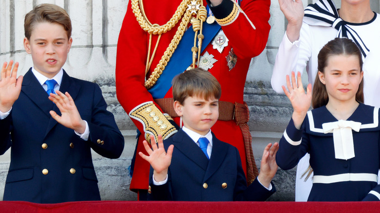 George, Louis, and Charlotte waving during 2024 Trooping the Colour