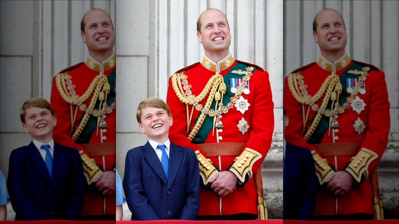 Prince George looking up with Prince William