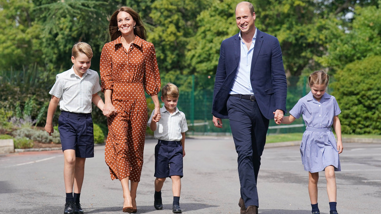 George, Kate, Louis, William, and Charlotte walking