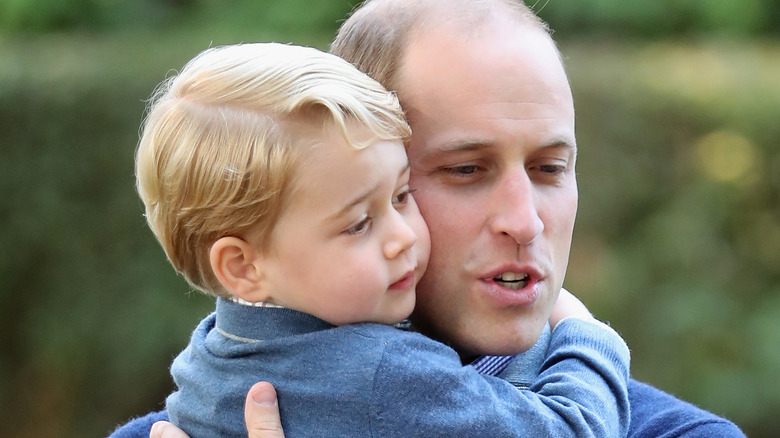 Prince William holds son Prince George