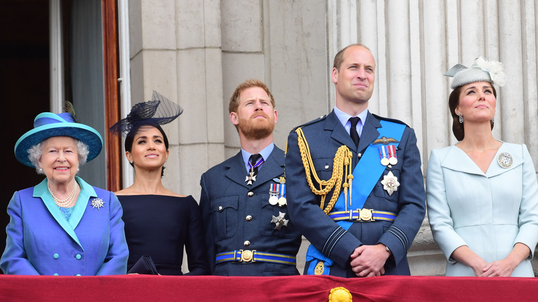 Royal family members looking up