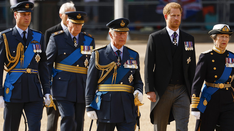 King Charles III and Prince Harry honoring Queen Elizabeth