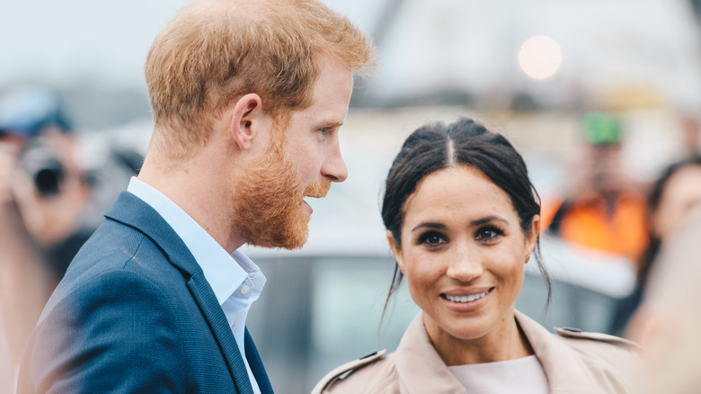 Prince Harry and Meghan Markle talking