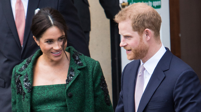 Meghan Markle and Prince Hary leaving Canada House