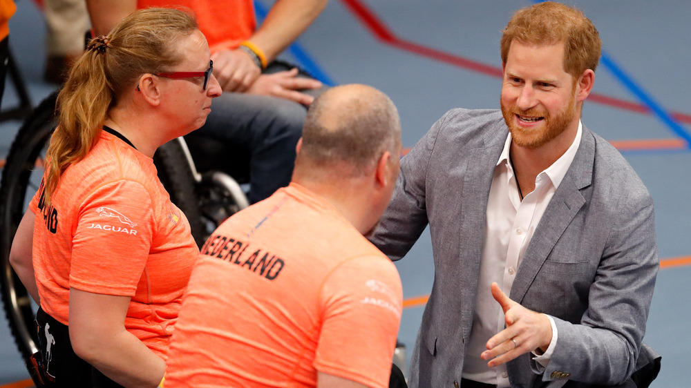 Prince Harry talking to fans