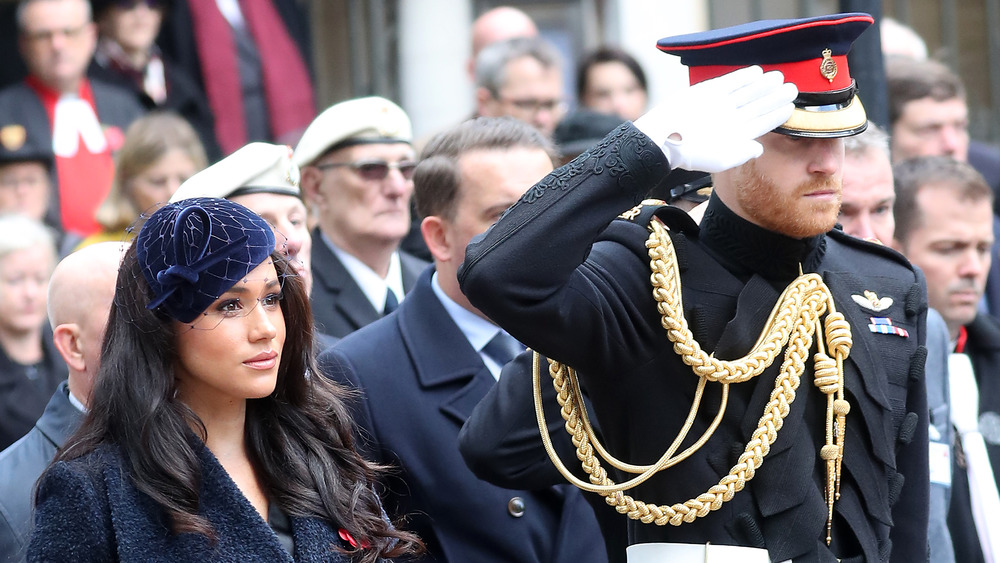 Prince Harry and Meghan Markle at a ceremony