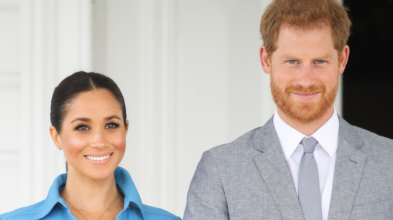 Prince Harry and Meghan Markle smiling