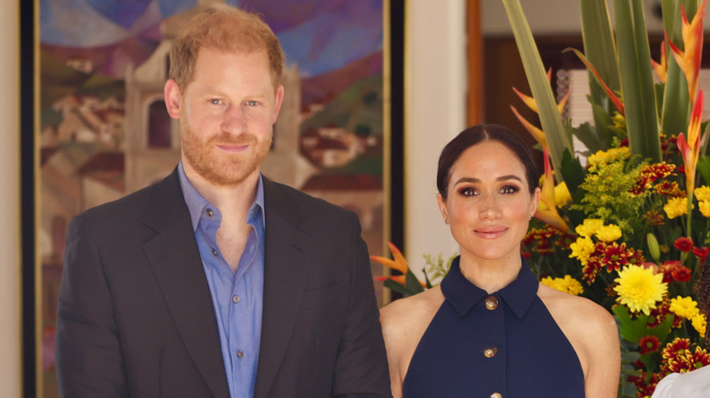 Prince Harry and Meghan Markle smiling