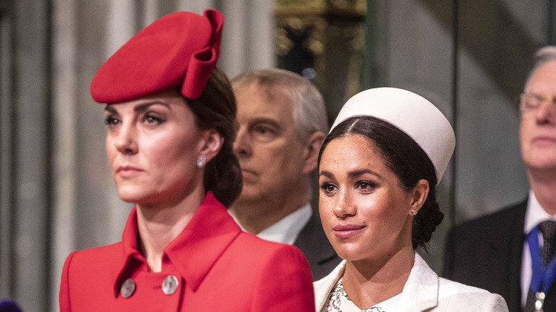 Kate Middleton and Meghan Markle at an event 