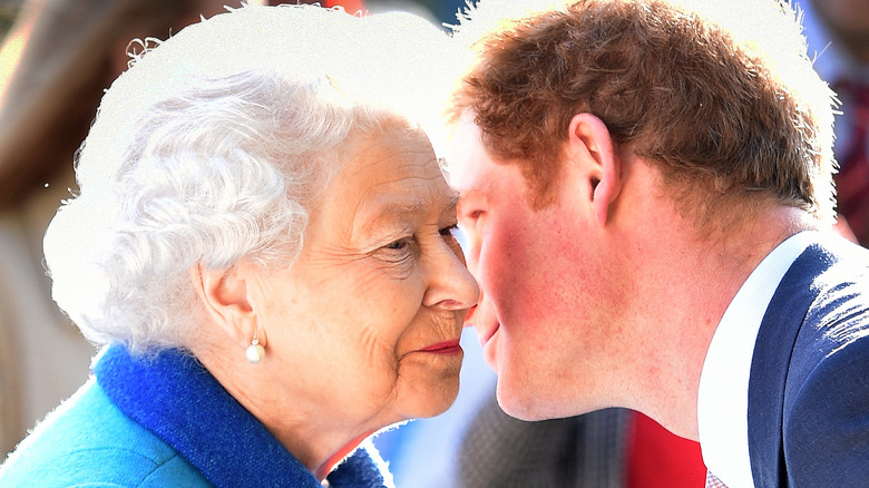 Prince Harry kissing Queen Elizabeth II