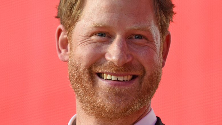 Prince Harry pictured in LA Rams locker room holding Super Bowl trophy  after watching game with Eugenie