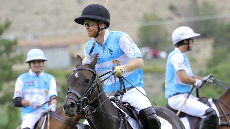 Prince Harry playing polo