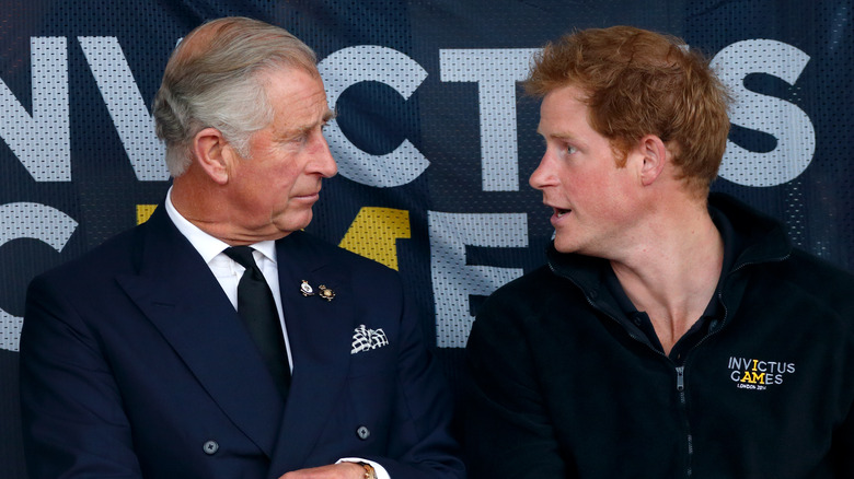 Prince Harry talking to King Charles