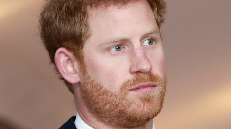 Prince Harry looks thoughtful