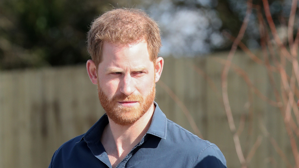 Prince Harry looks serious