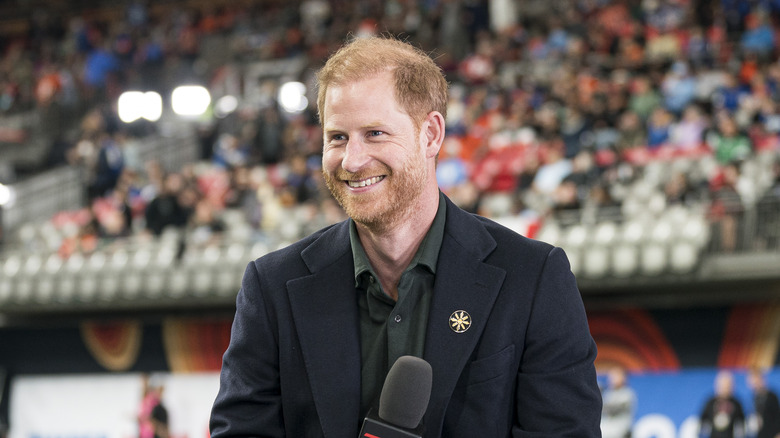 Prince Harry smiling at a Canadian Football League event