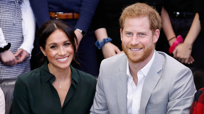 Prince Harry and Meghan Markle posing