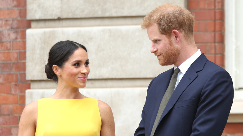 Meghan Markle and Prince Harry looking at each other