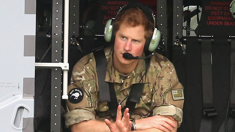 Prince Harry in a helicopter