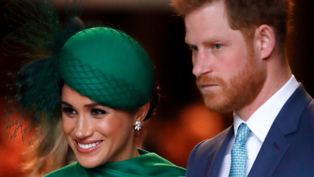 Prince Harry and Meghan Markle smiling