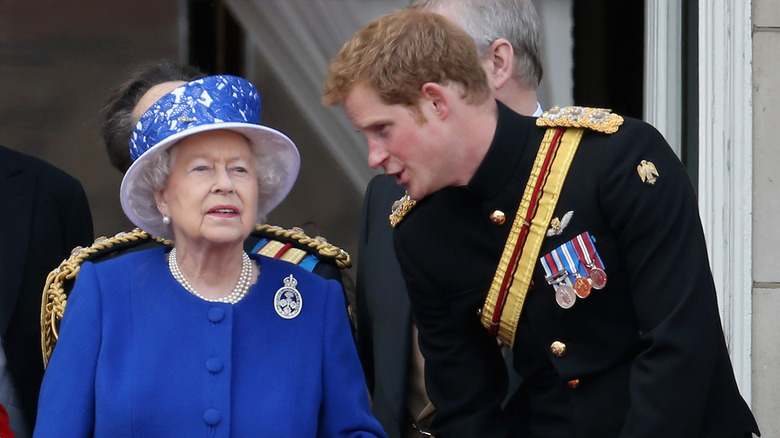 Prince Harry chats with Queen Elizabeth II