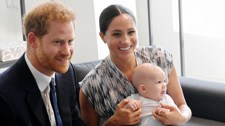 prince harry and meghan markle with baby archie