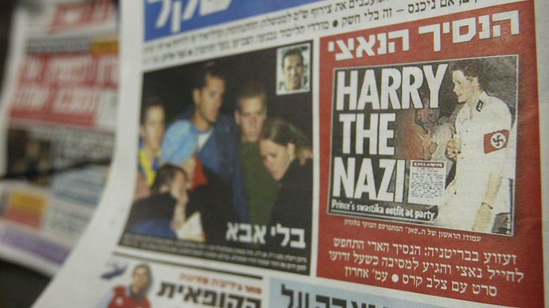 A newspaper photo of Harry in a Nazi uniform