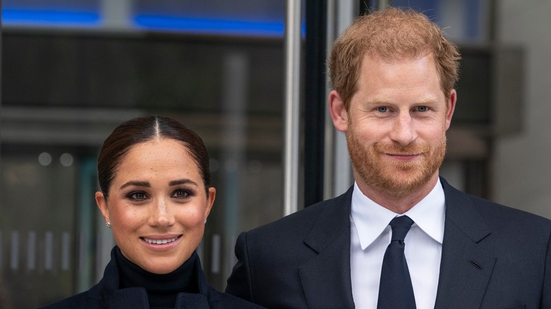 Prince Harry and Meghan Markle smiling