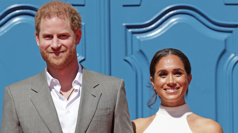 Prince Harry and Meghan Markle smiling