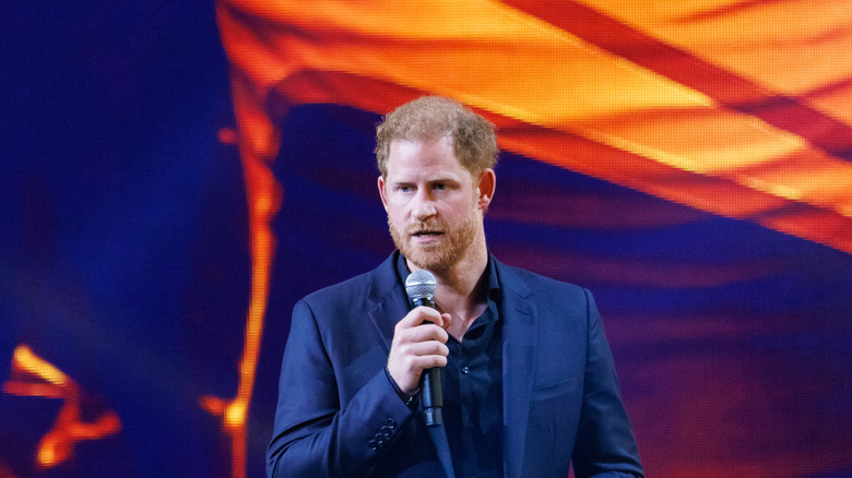 Prince Harry speaking on stage