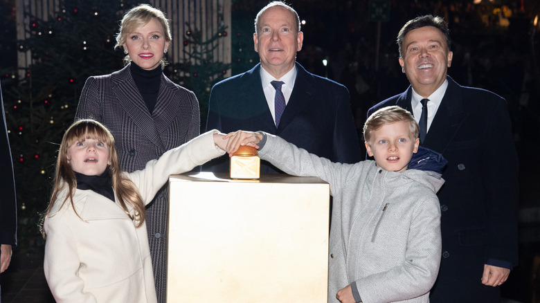 Princess Gabriella and Prince Jacques press a button at an official event