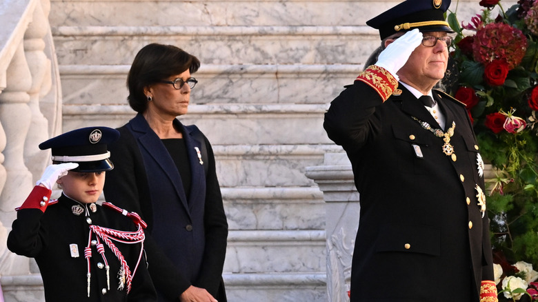 Prince Jacques and Prince Albert salute at the same time