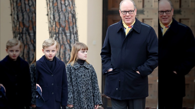 Prince Jacques and Princess Gabriella walk with Prince Albert