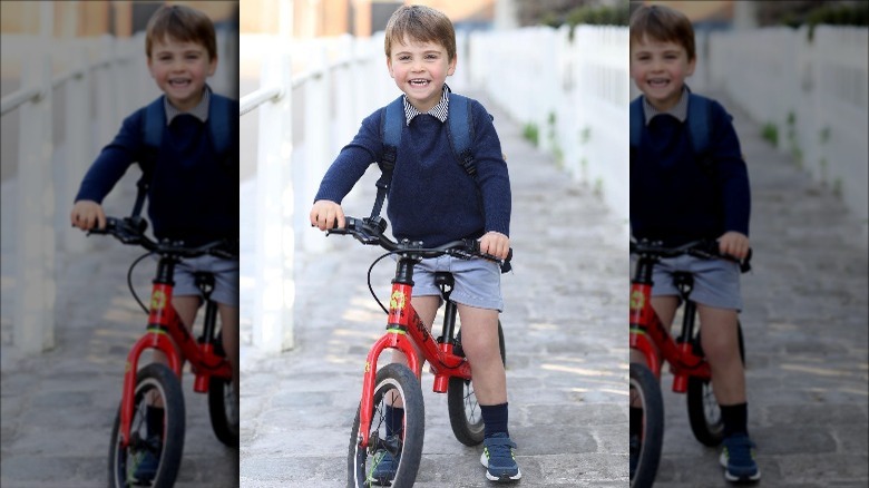 Prince Louis rides his bike