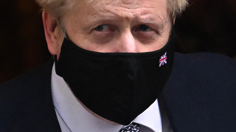 Boris Johnson wearing a face mask