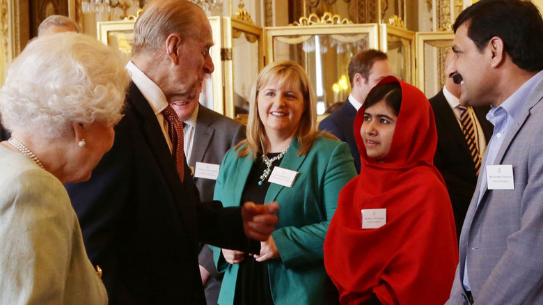 Philip greets Malala