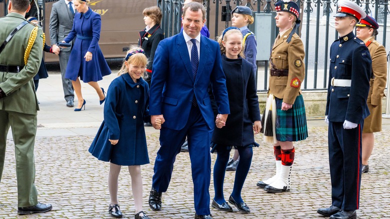 Peter Phillips walking with Savannah and Isla