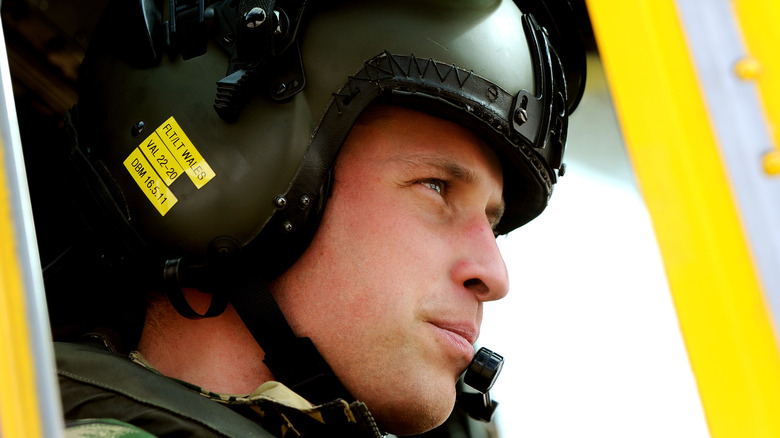 Prince William in a helicopter