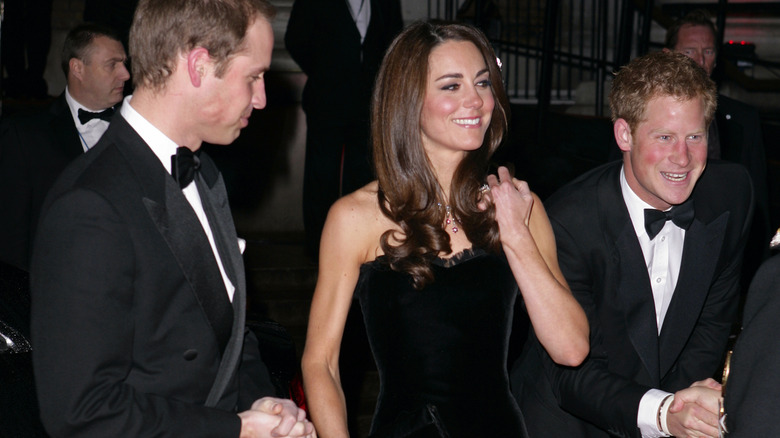 William, Catherine, and Harry in black evening wear