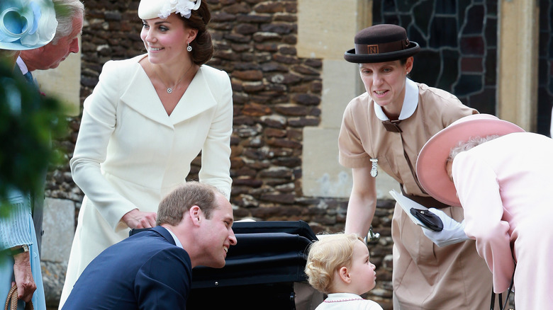 The family surrounds Prince George