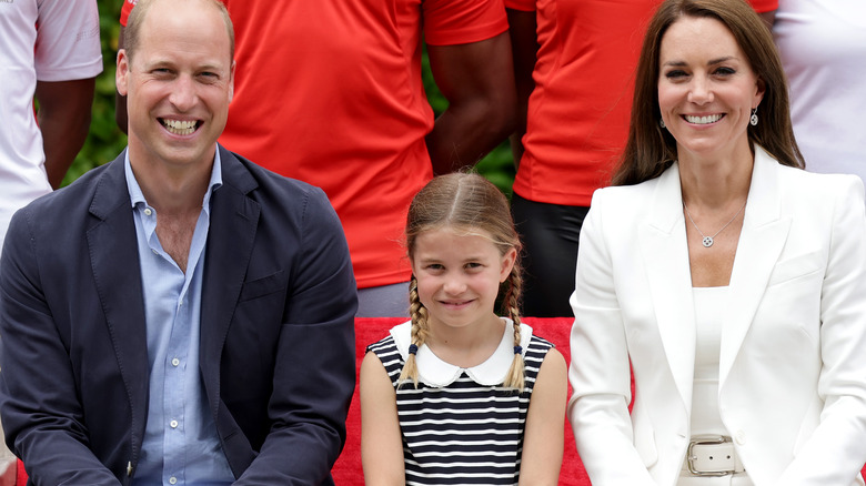 William, Catherine, and Charlotte smile for photo