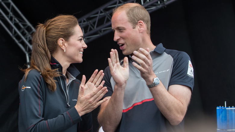 Prince William and Princess Catherine clapping 