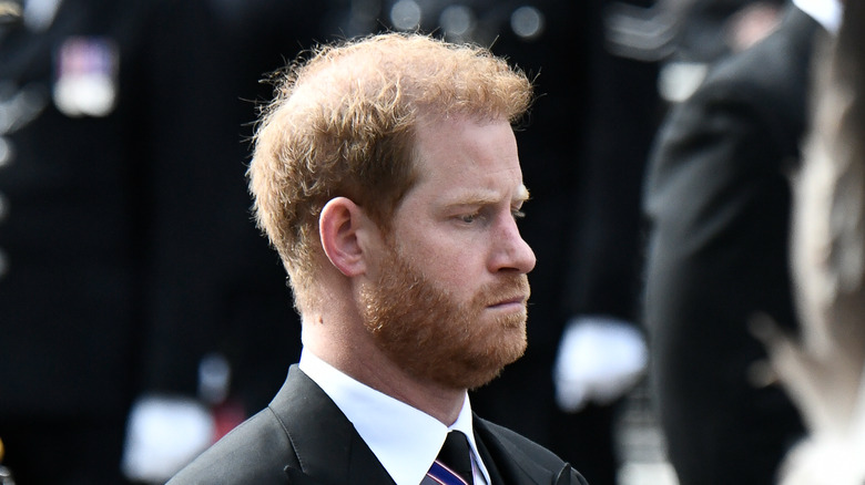 Prince Harry looks downcast at the queen's funeral