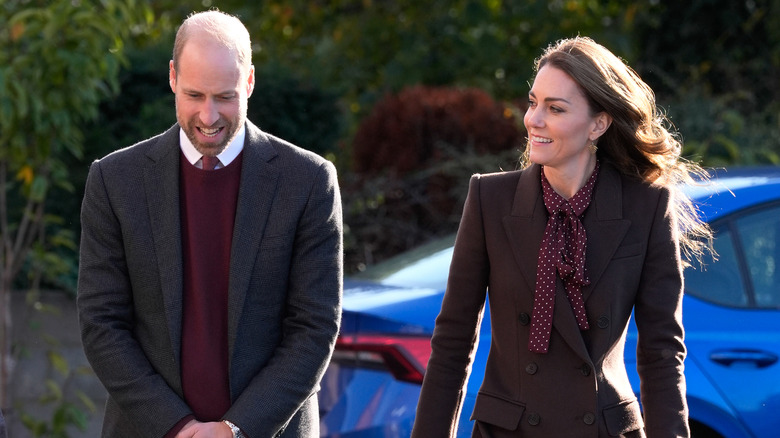 Prince William and Kate Middleton talking and smiling