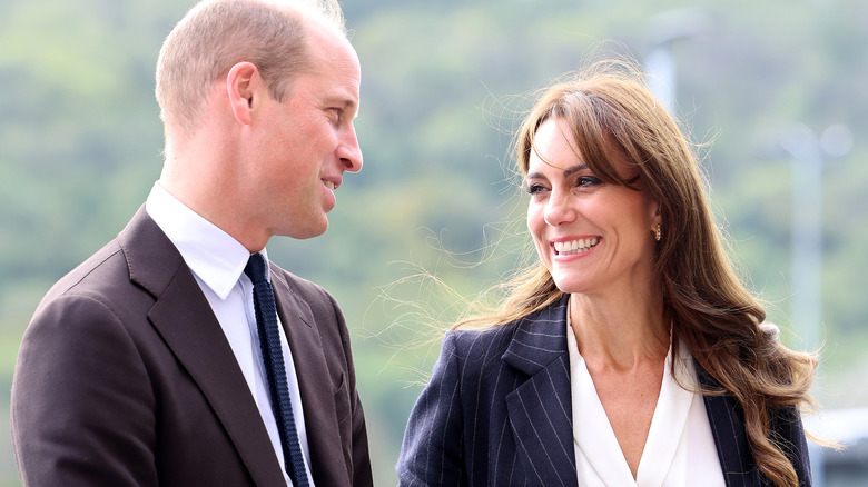 Prince William and Princess Catherine looking at each other adoringly